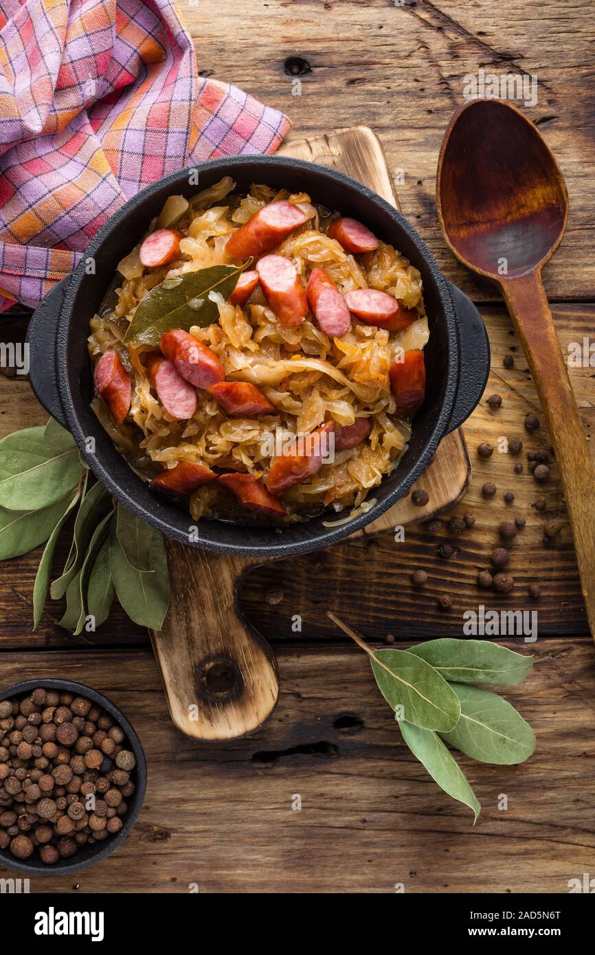 Cabbage braised with sausages, sauerkraut. German cuisine Stock Photo