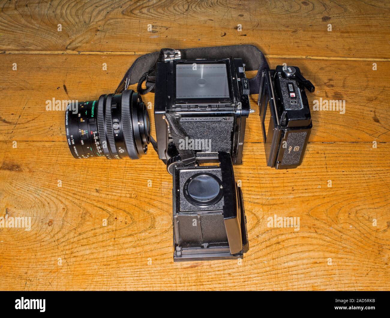 Medium format cameras have various compnats that can be changed such as film baccks and view fiders. Stock Photo