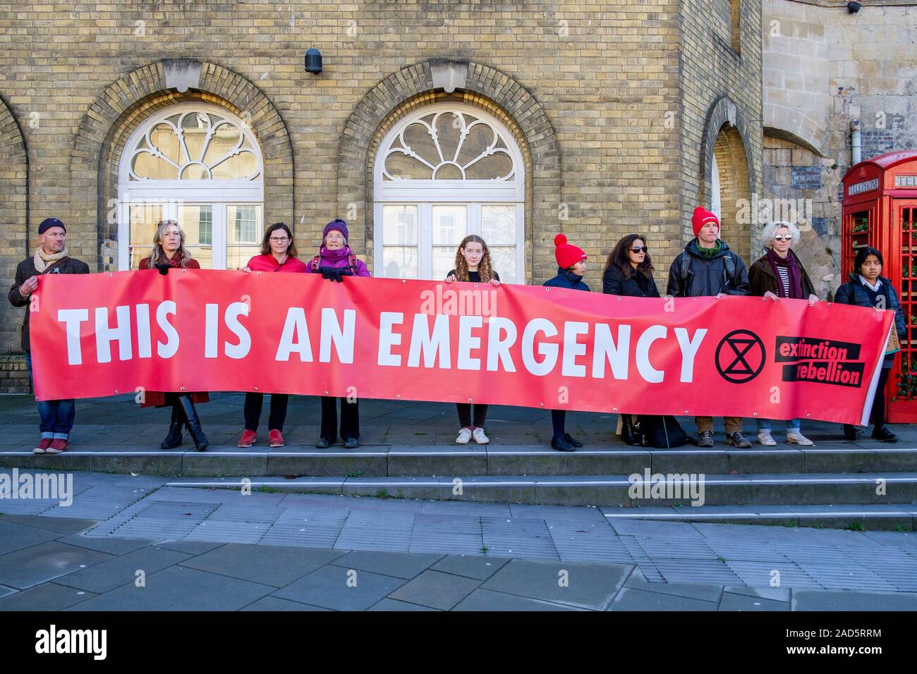 Banner carrying Extinction Rebellion protesters are pictured as they join students + school children in a climate change protest march Bath 29-11-19 Stock Photo