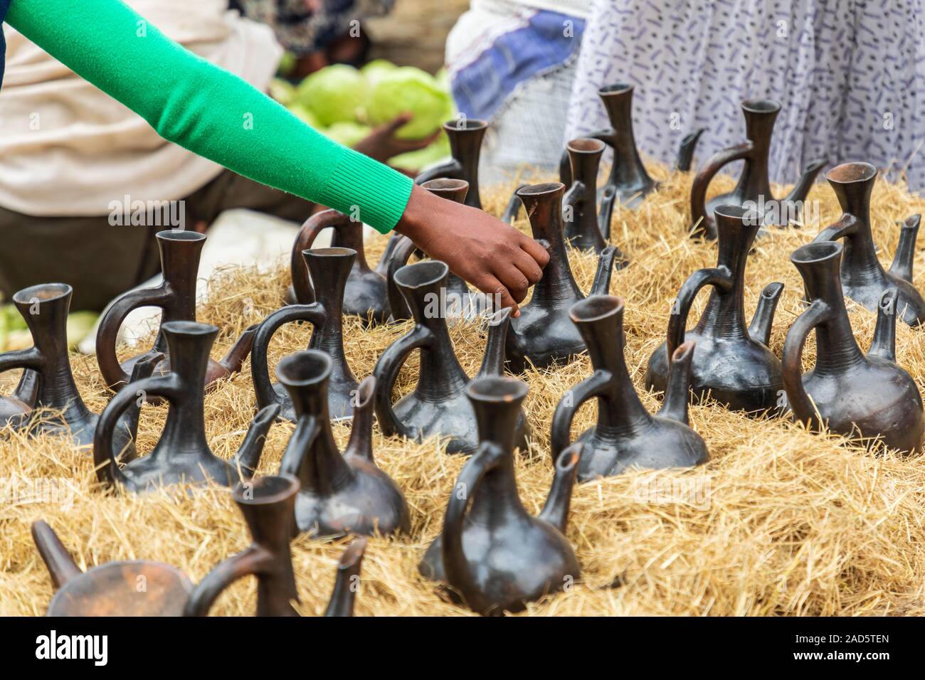 Ethiopia. Amhara. Debark. Ceramic coffee pots for sale at the market in
