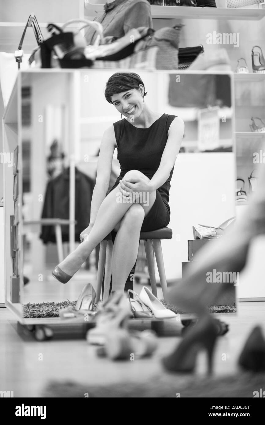 Woman Trying New Shoes Stock Photo