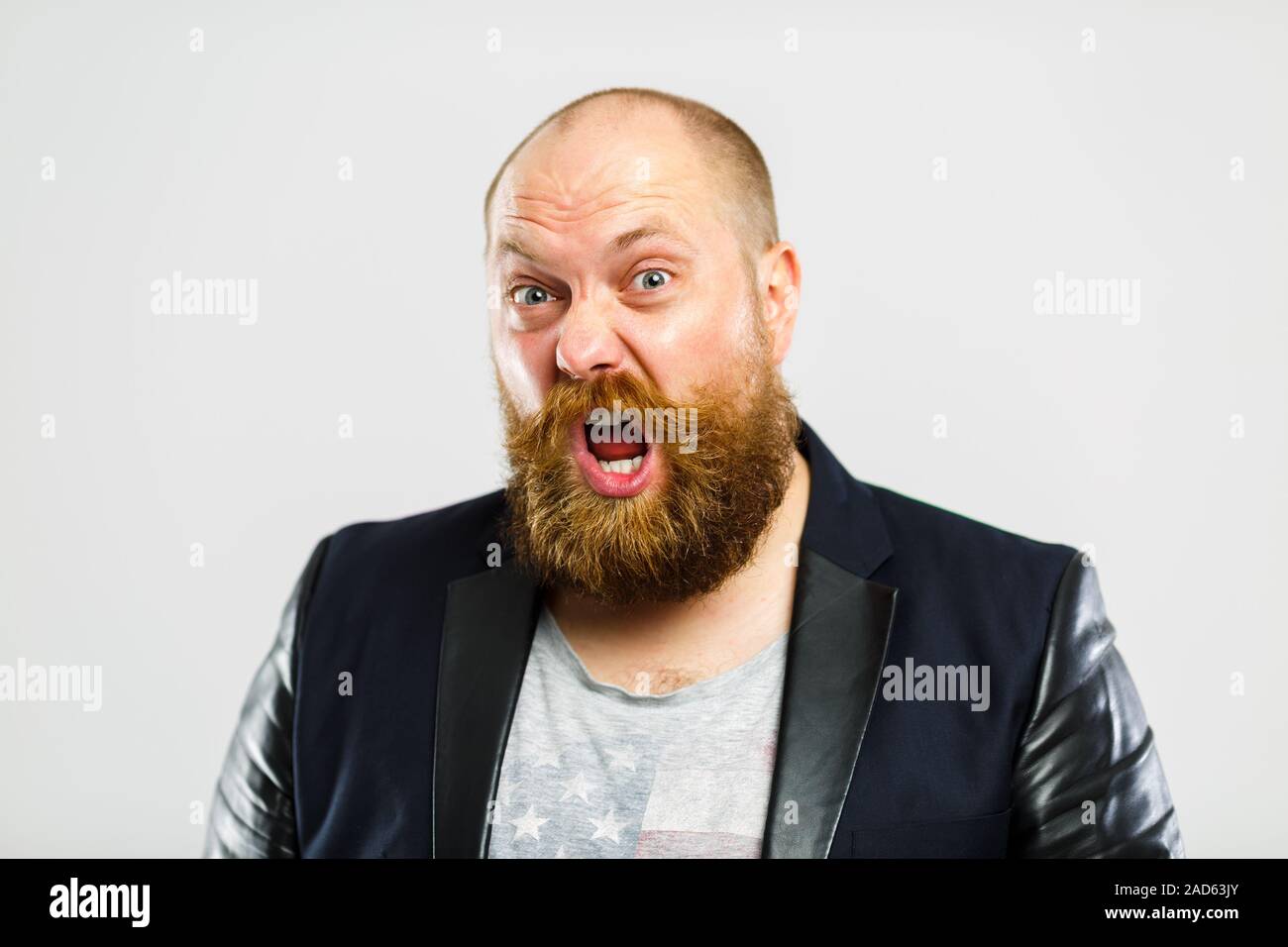Screaming brutal man with beard Stock Photo