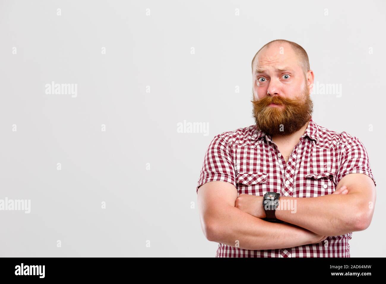 Bewildered man with ginger beard Stock Photo