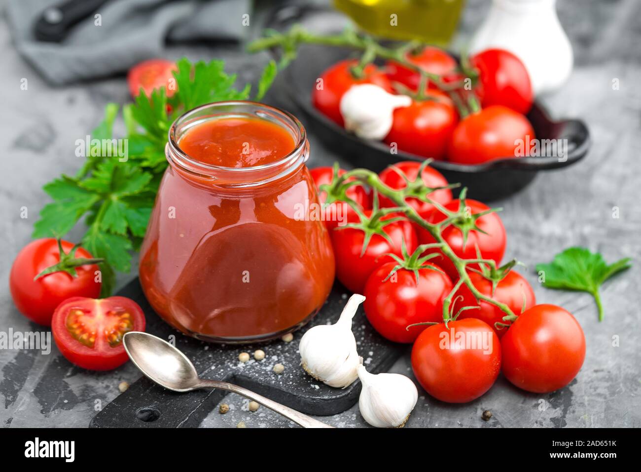 Tomato paste and fresh tomatoes, tomatos puree Stock Photo Alamy