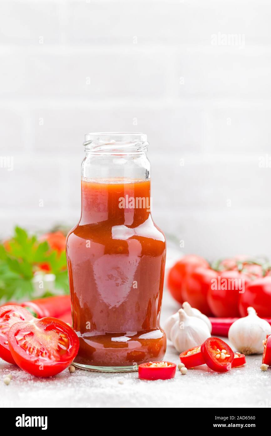 Tomato ketchup, chilli sauce, tomatos puree with chili pepper, tomatoes