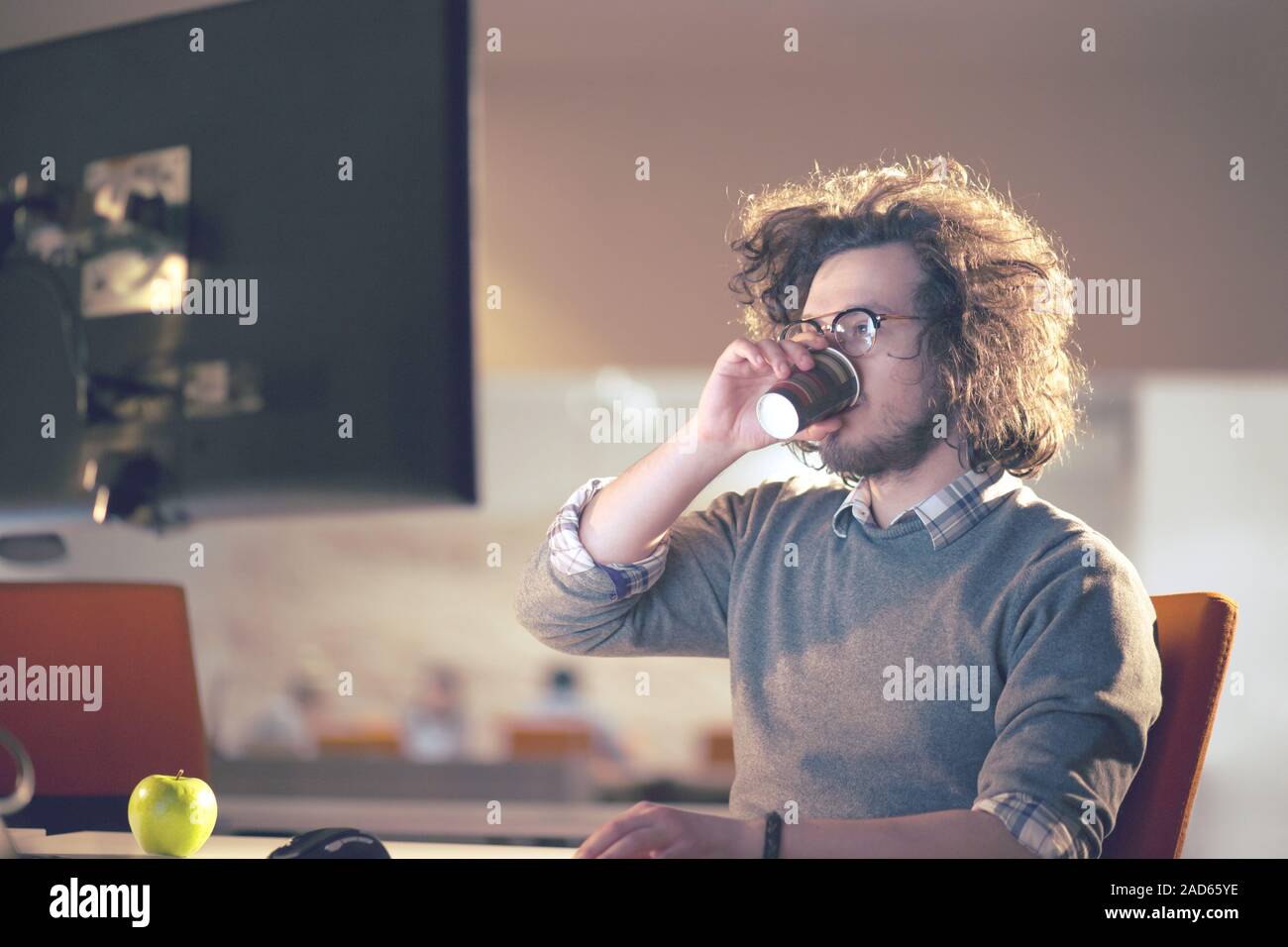 Tired Businessman working late Stock Photo