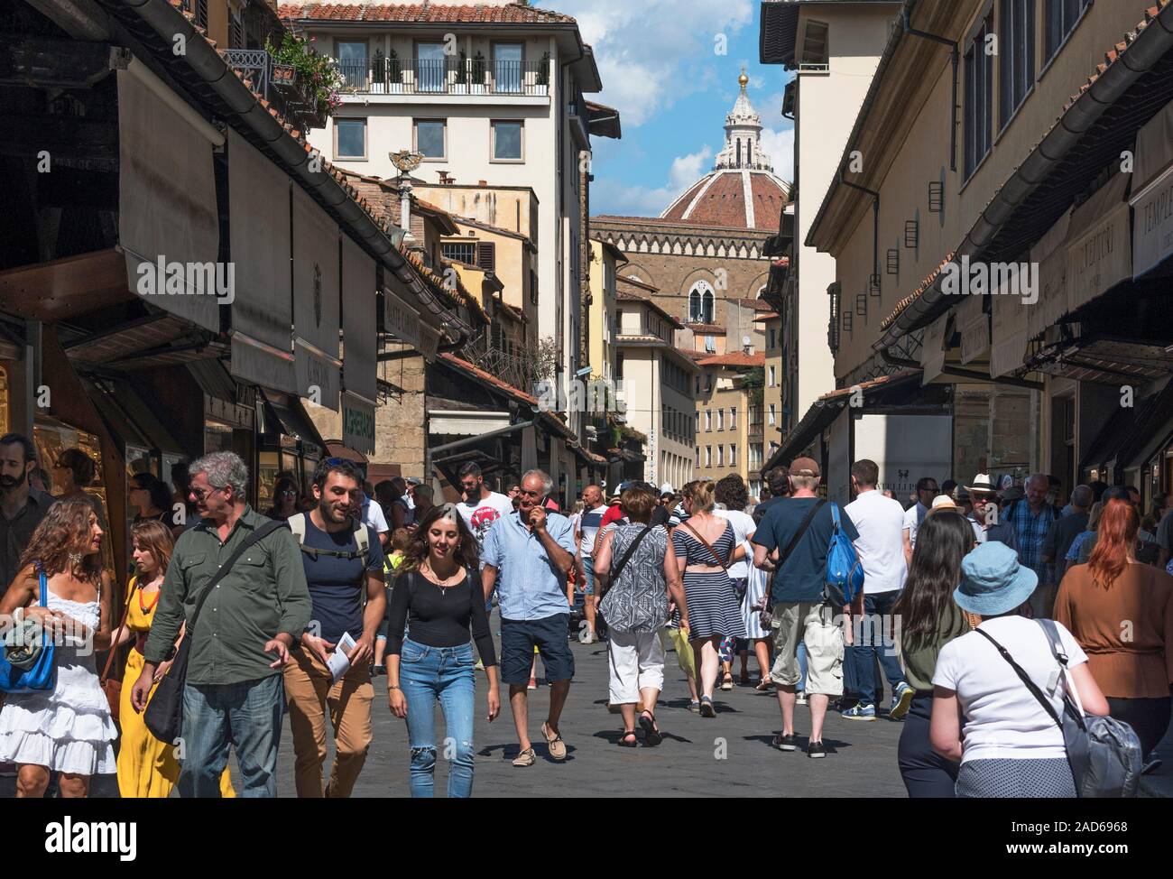 tourists visitors shopping on the ponte vecchio,  streets of florence in tuscany, italy. Stock Photo