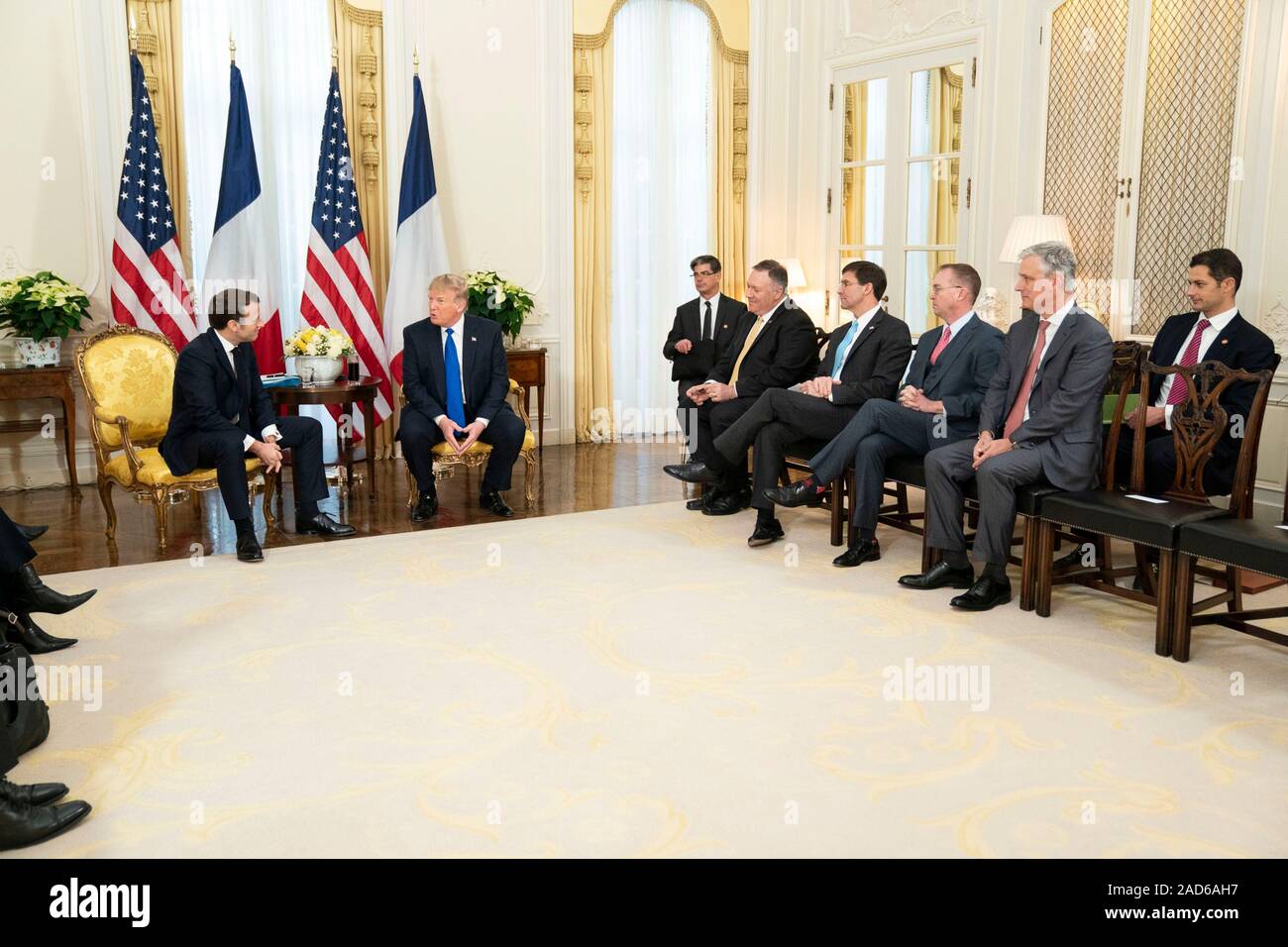 London, UK. 03 December, 2019. U.S. President Donald Trump and French President Emmanuel Macron pose for photographers prior to the start of their bilateral meeting before the NATO Summit at Winfield House December 3, 2019 in London, UK.   Credit: Shealah Craighead/Planetpix/Alamy Live News Stock Photo