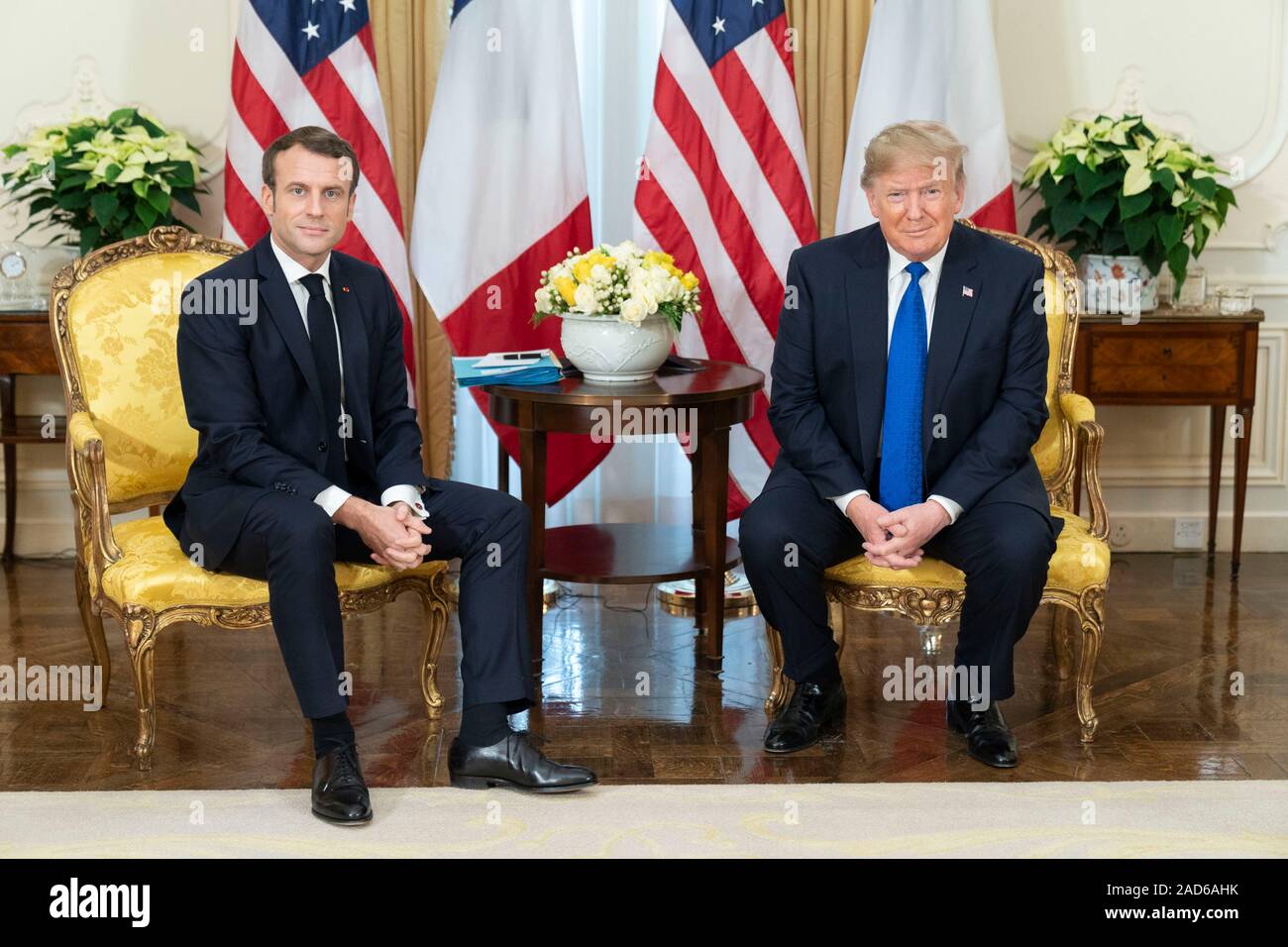 London, UK. 03 December, 2019. U.S. President Donald Trump and French President Emmanuel Macron pose for photographers prior to the start of their bilateral meeting before the NATO Summit at Winfield House December 3, 2019 in London, UK.   Credit: Shealah Craighead/Planetpix/Alamy Live News Stock Photo