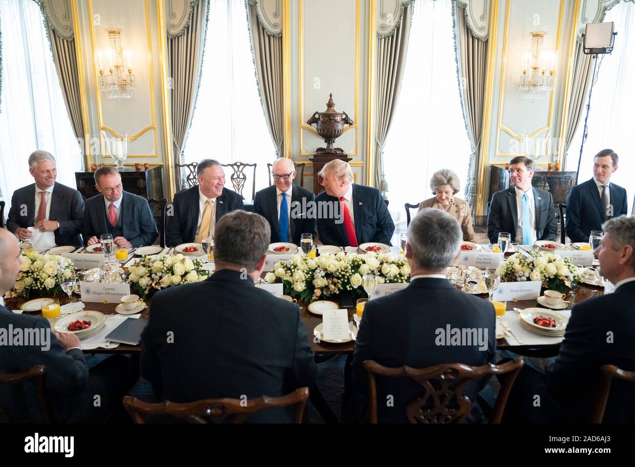 London, UK. 03 December, 2019. U.S. President Donald Trump during a breakfast meeting with NATO Secretary General Jens Stoltenberg before the start of the NATO Summit at Winfield House December 3, 2019 in London, UK. Joining the President is Chief of Staff Mick Mulvaney, 2nd left, Secretary of State Mike Pompeo, 3rd left, Ambassador to Great Britain Woody Johnson, center left, Ambassador to NATO Kay Bailey Hutchison, center right, Secretary of Defense Mark Esper and Presidential son-in-law Jared Kushner, right.      Credit: Shealah Craighead/Planetpix/Alamy Live News Stock Photo