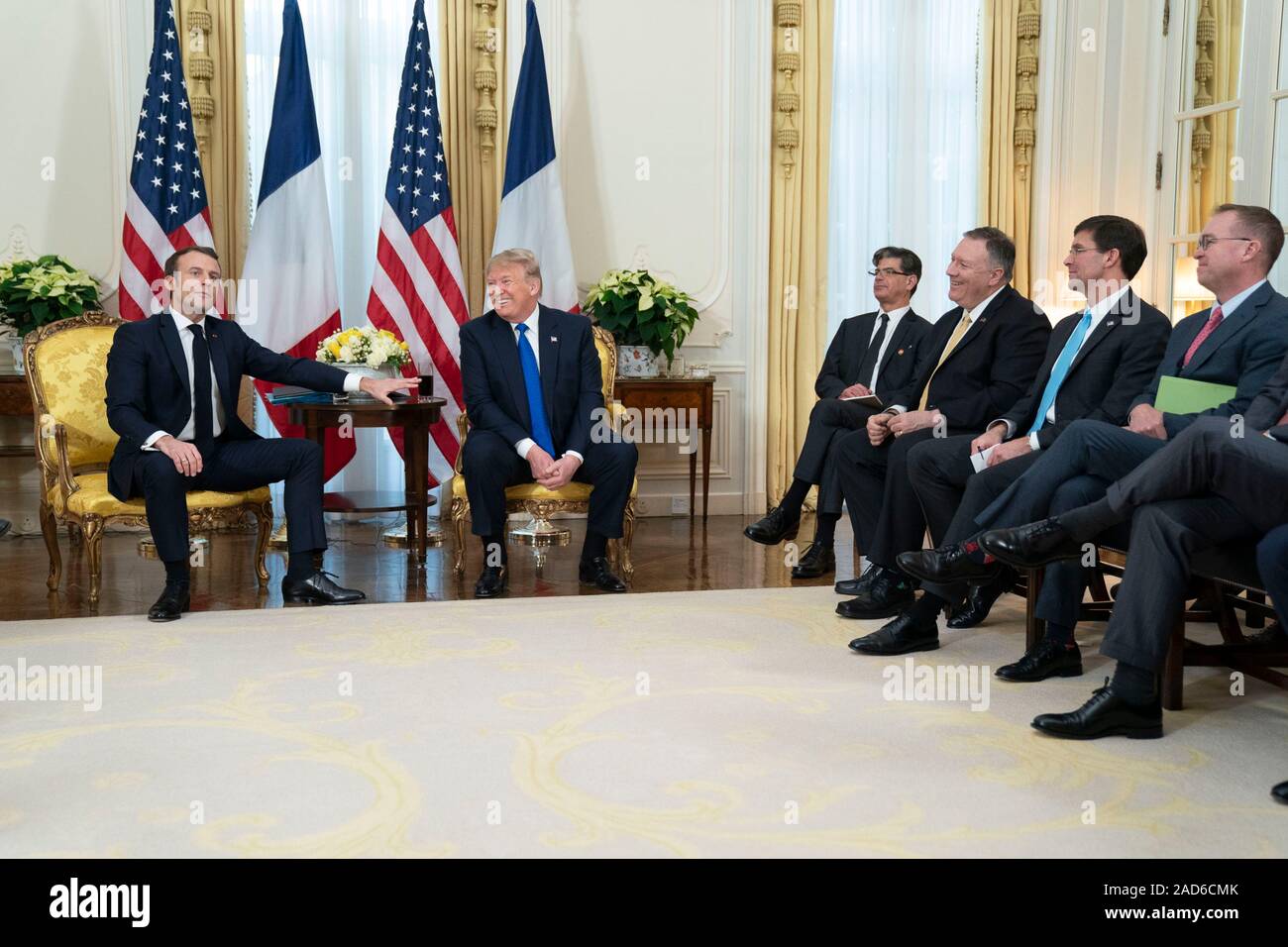 London, UK. 03 December, 2019. U.S. President Donald Trump and French President Emmanuel Macron pose for photographers prior to the start of their bilateral meeting before the NATO Summit at Winfield House December 3, 2019 in London, UK.  Credit: Shealah Craighead/Planetpix/Alamy Live News Stock Photo