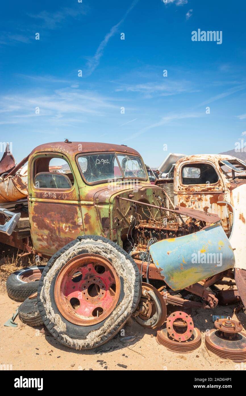 rusty old cars and trucks in a junk yard in the desert in Phoenix Arizona  USA Stock Photo - Alamy