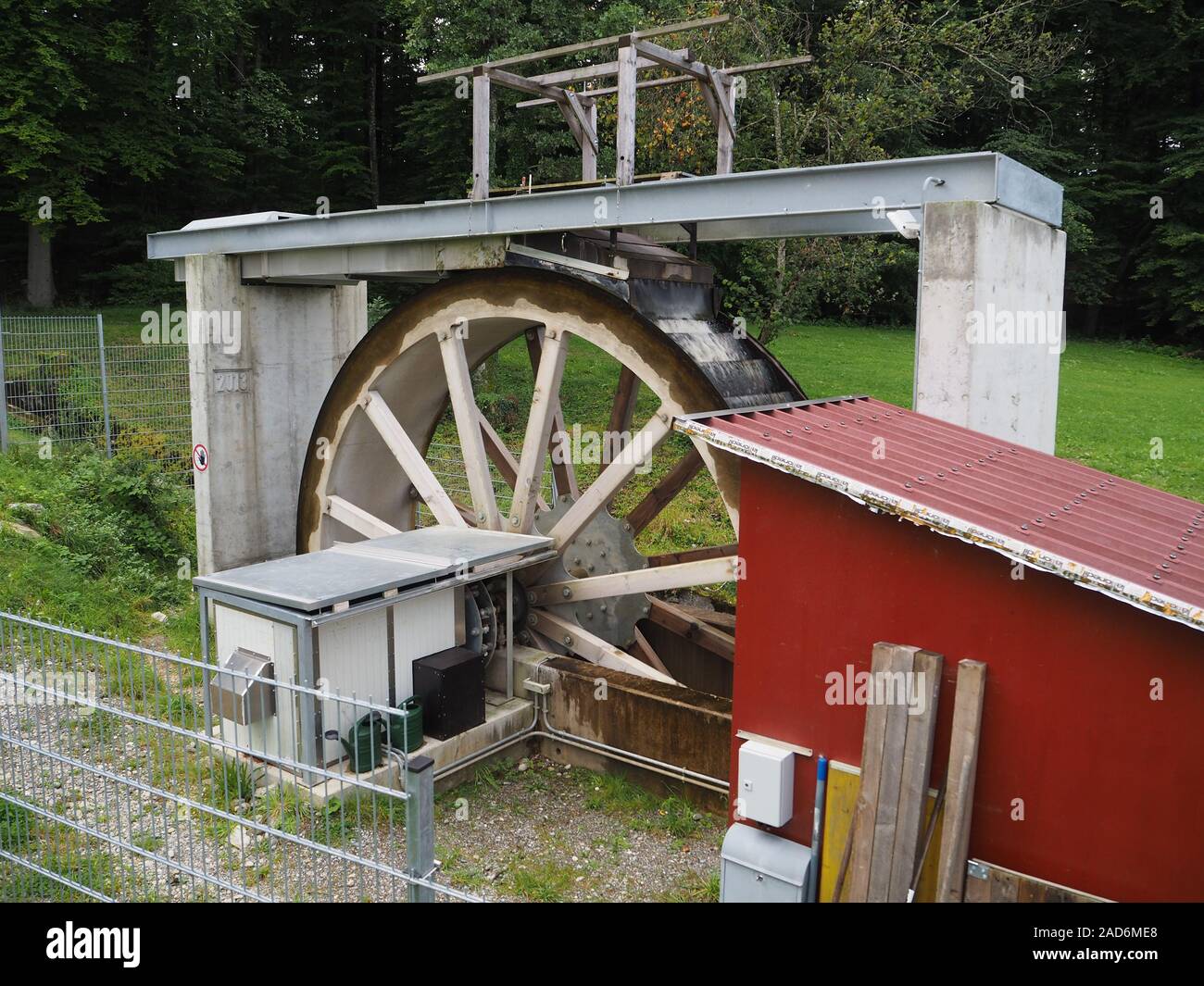 Water wheel to generate electricity. Stock Photo