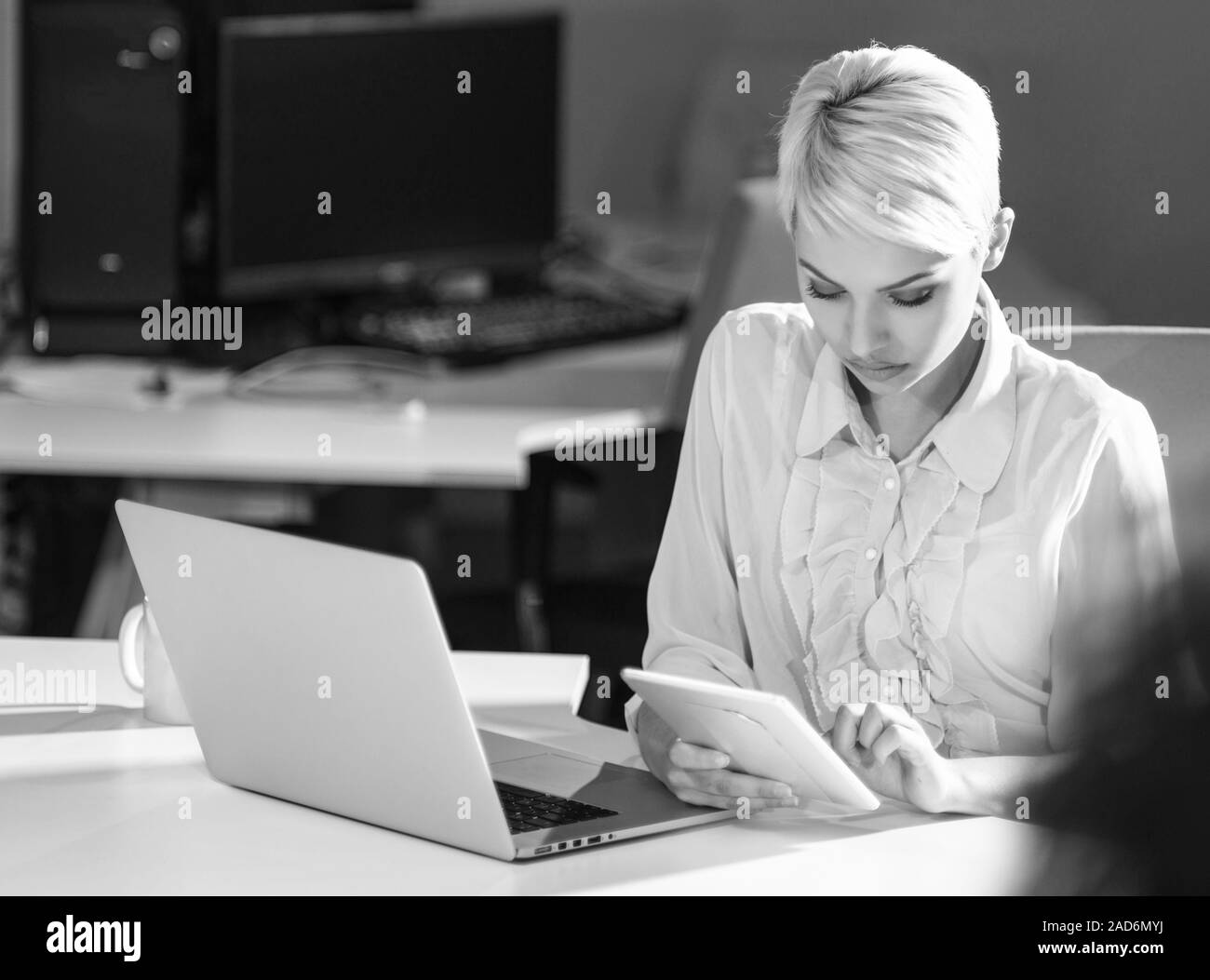 Working desk laptop tablet Black and White Stock Photos & Images - Alamy