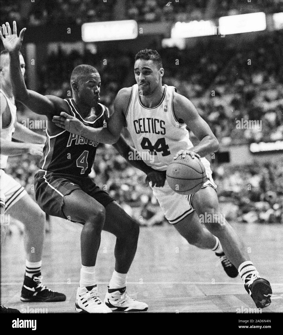 Boston Celtics Rick Fox drives  the ball as Detroit Pistons Joe Dumars defends during basketball game action at the Fleet Center in Boston Ma USA photo by bill belknap Stock Photo