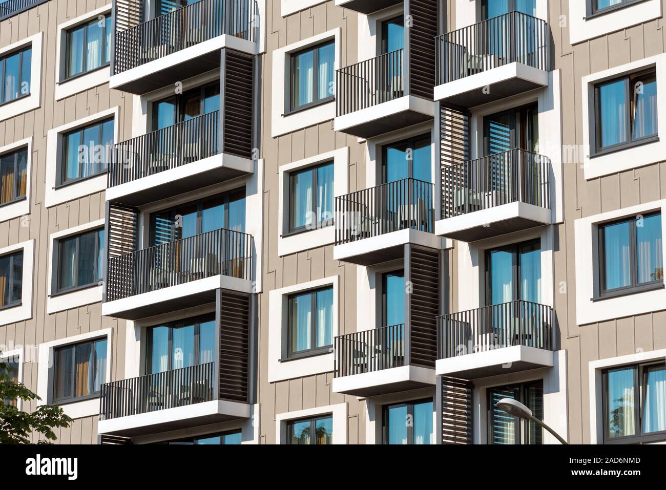Detail of a modern apartment building with lots of balconies Stock Photo