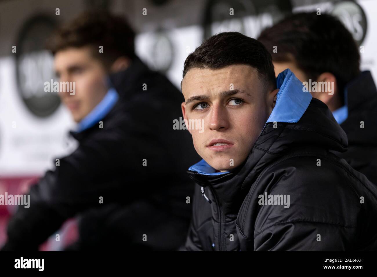 Burnley, UK. 03rd Dec, 2019. Phil Foden of Manchester City watches on from the bench before the Premier League match between Burnley and Manchester City at Turf Moor on December 3rd 2019 in Burnley, England. (Photo by Daniel Chesterton/phcimages.com) Credit: PHC Images/Alamy Live News Stock Photo