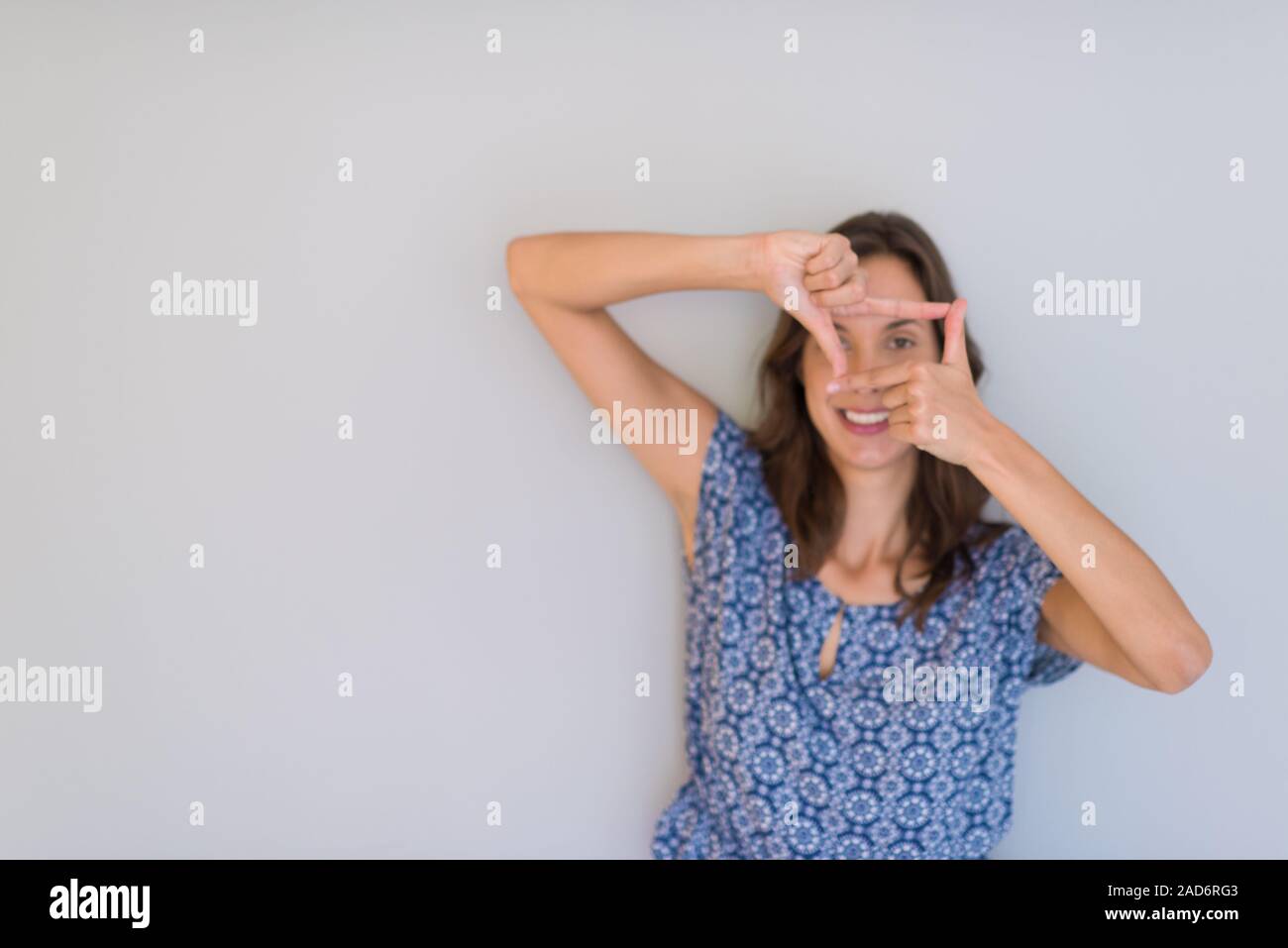 woman showing framing hand gesture Stock Photo Alamy