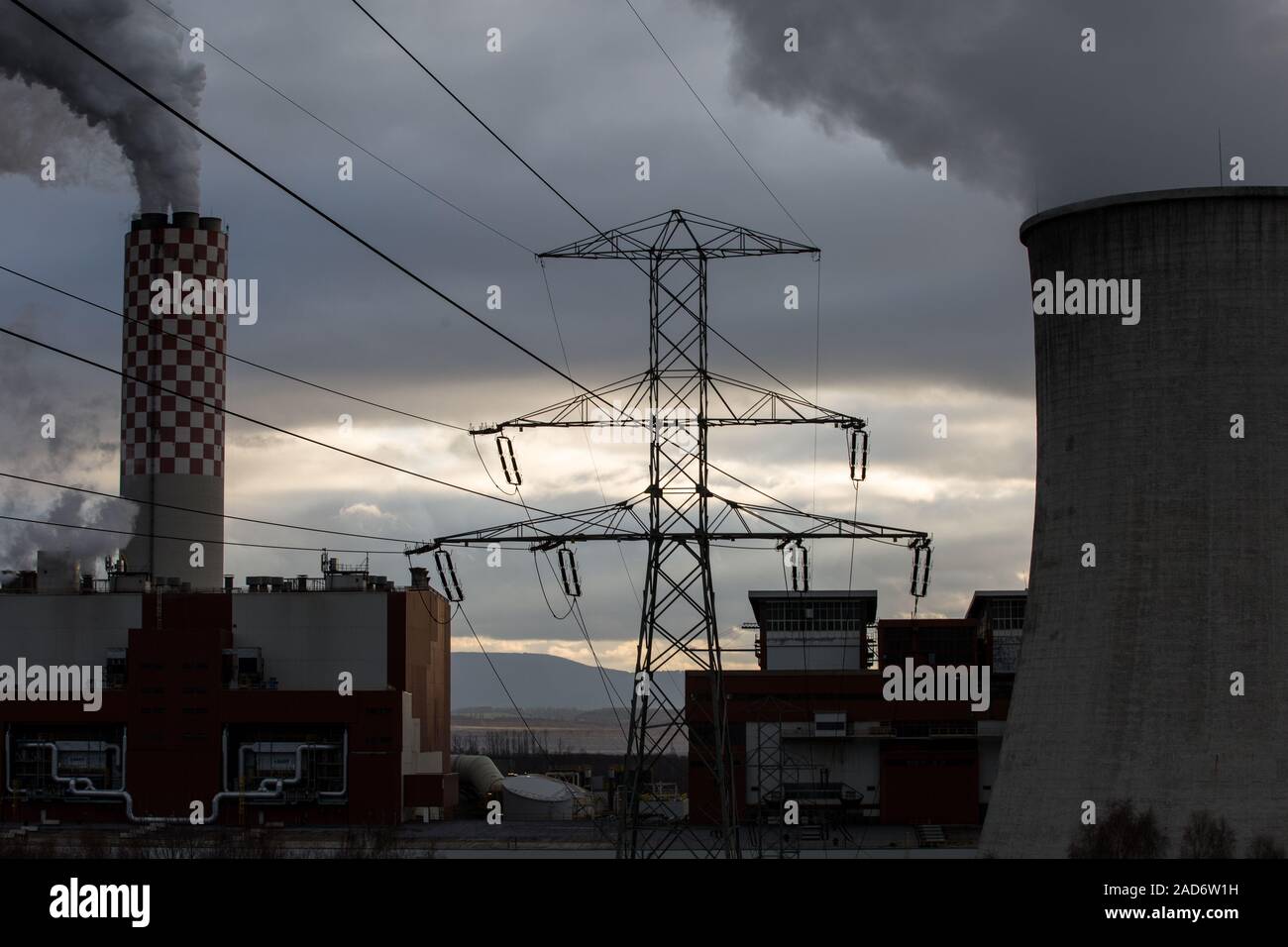 A view of a sixchannels chimney, an overhead power line and cooling