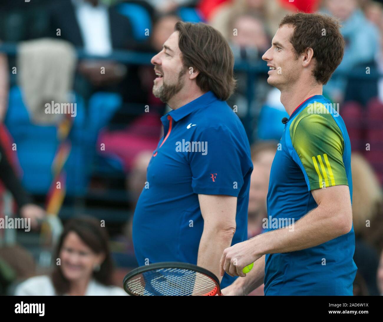 Jonathan Ross and Andrew Murray appearing in a charity tennis tournament at Queen's tennis club in London with Andrew Murray, Michael McIntyre, Jimmy Carr, Boris Johnson and Sir Richard Branson on behalf of the Ross Hutchins and Royal Marsden cancer charity in 2013. Stock Photo