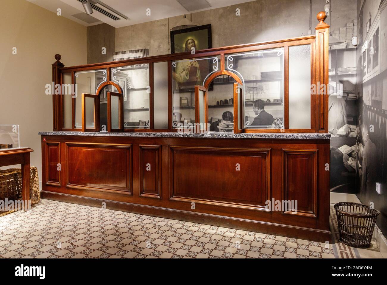 A traditional counter service reconstruction of a Maltese Post Office at the Post Office Museum in Valletta, Malta. Stock Photo