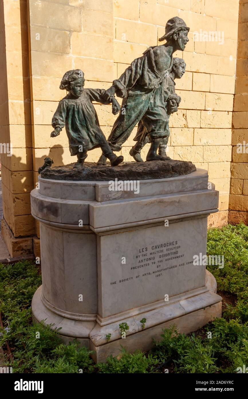A replica of the 1905 statue Les Gavroches (The street boys) by the Maltese sculptor Antonio Sciortino in the Upper Barrakka Gardens, Valletta, Malta. Stock Photo