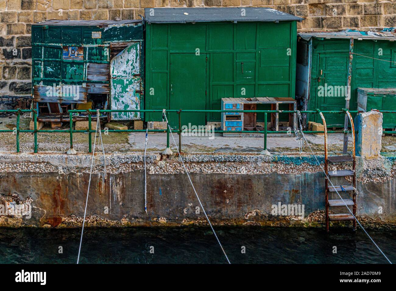 Fisherman's dockside facilities at Valletta, Malta. Assorted sheds and