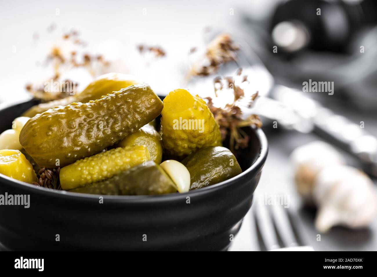 Pickled cucumbers, small marinated pickles, gherkins Stock Photo