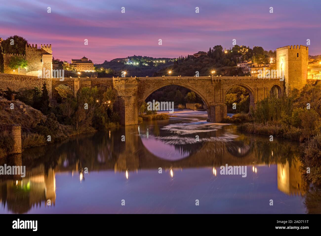 The Puente de San Martin in Toledo, Spain, before sunrise Stock Photo