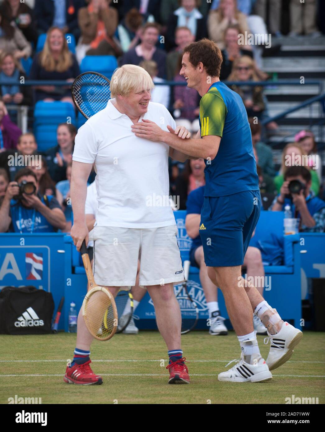 Boris Johnson and Andrew Murray  appearing in a charity tennis tournament at Queen's tennis club in London with Michael McIntyre, Jimmy Carr, Jonathan Ross and Sir Richard Branson on behalf of the Ross Hutchins and Royal Marsden cancer charity in 2013. Stock Photo