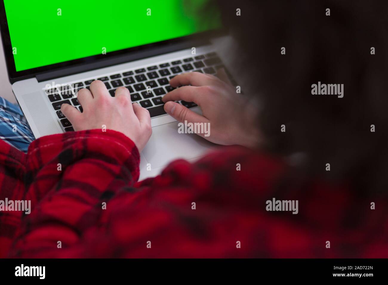 man freelancer in bathrobe working from home Stock Photo