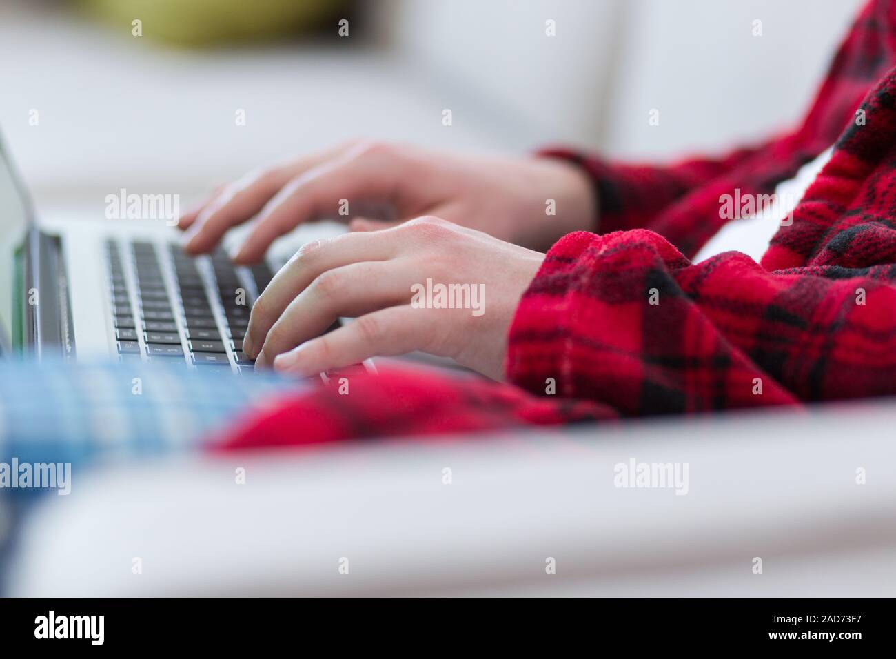 man freelancer in bathrobe working from home Stock Photo