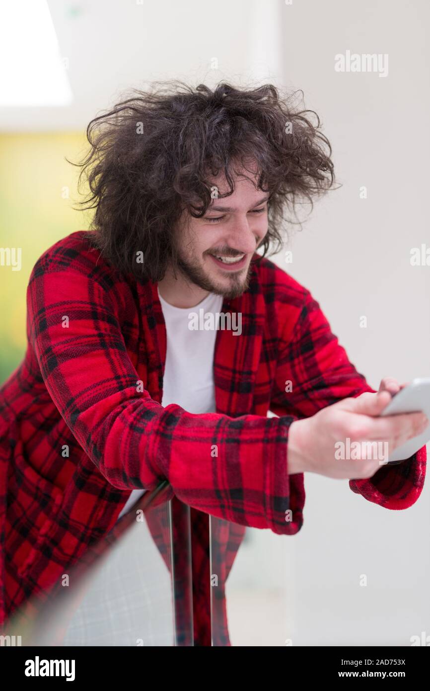 young freelancer using tablet computer Stock Photo