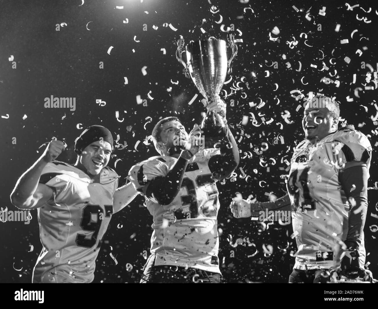 American football players celebrating Black and White Stock Photos
