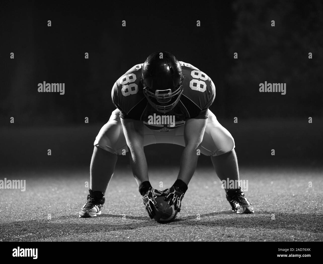 American football player starting football game Stock Photo Alamy