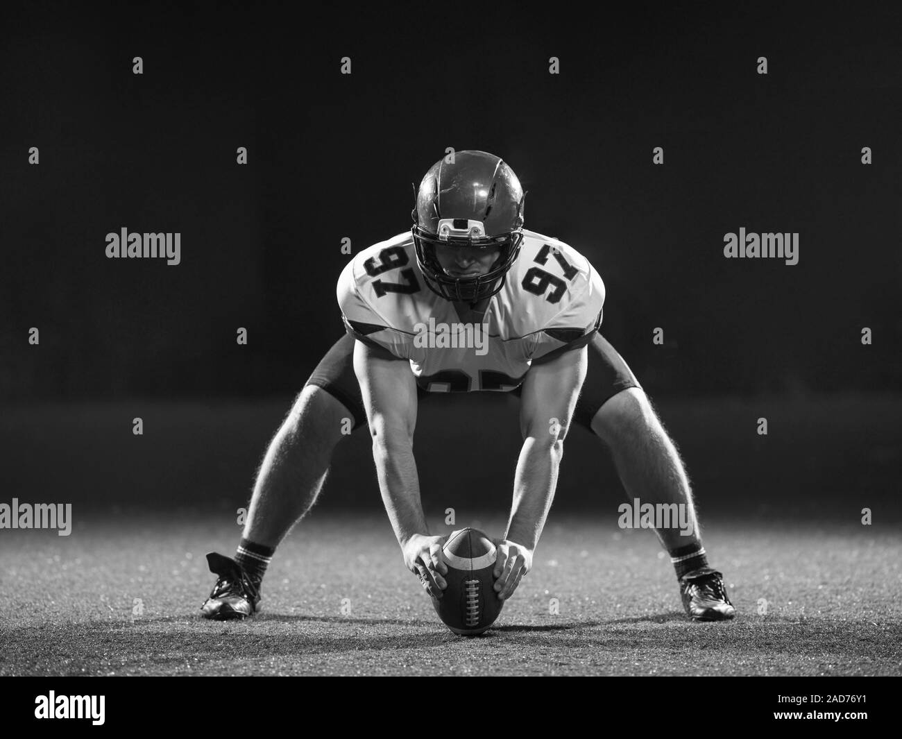 American football player starting football game Stock Photo Alamy