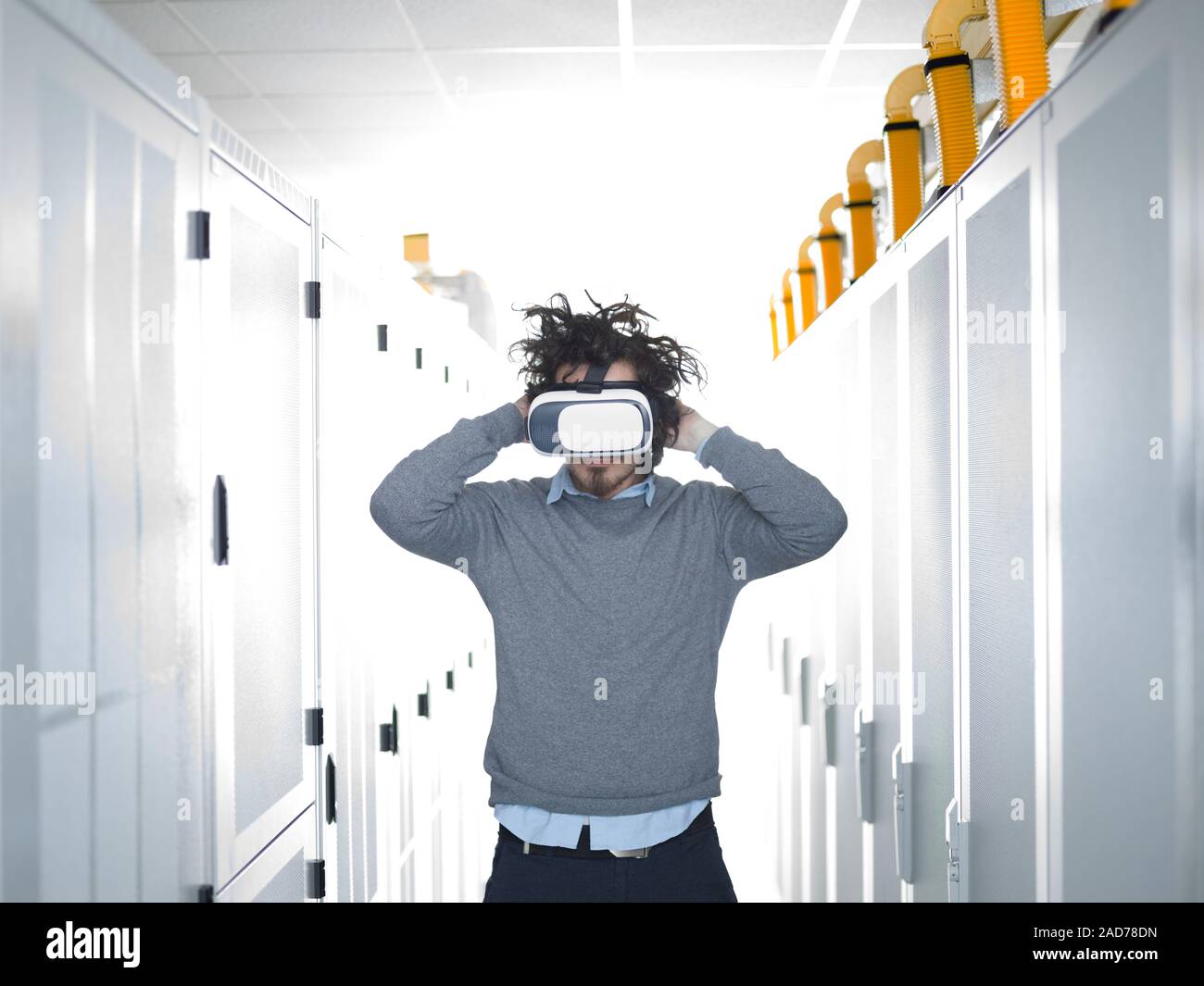 IT engeneer using virtual reality headset Stock Photo