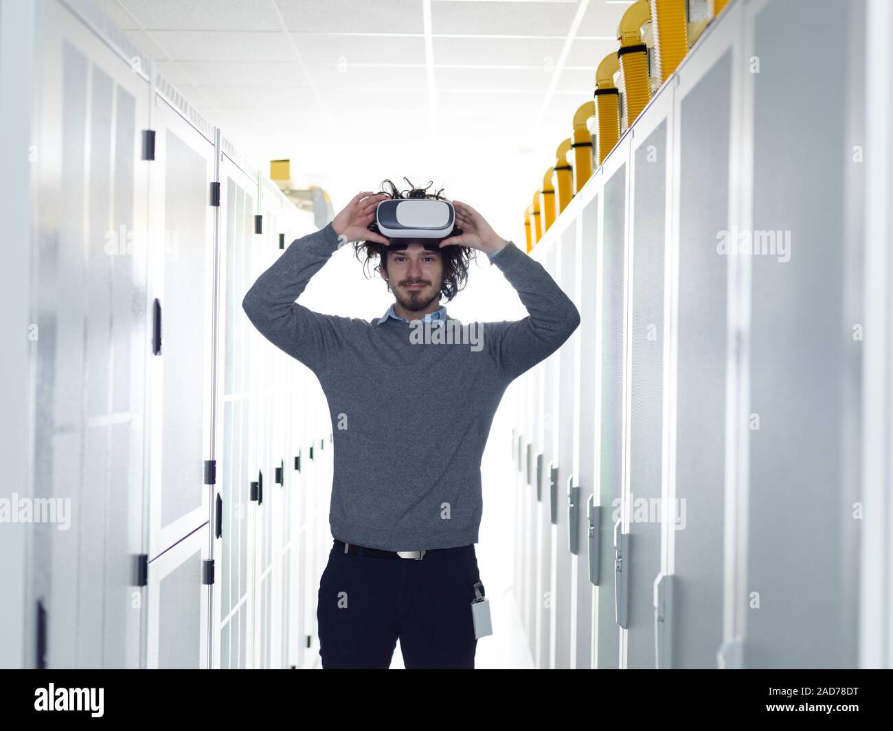 IT engeneer using virtual reality headset Stock Photo