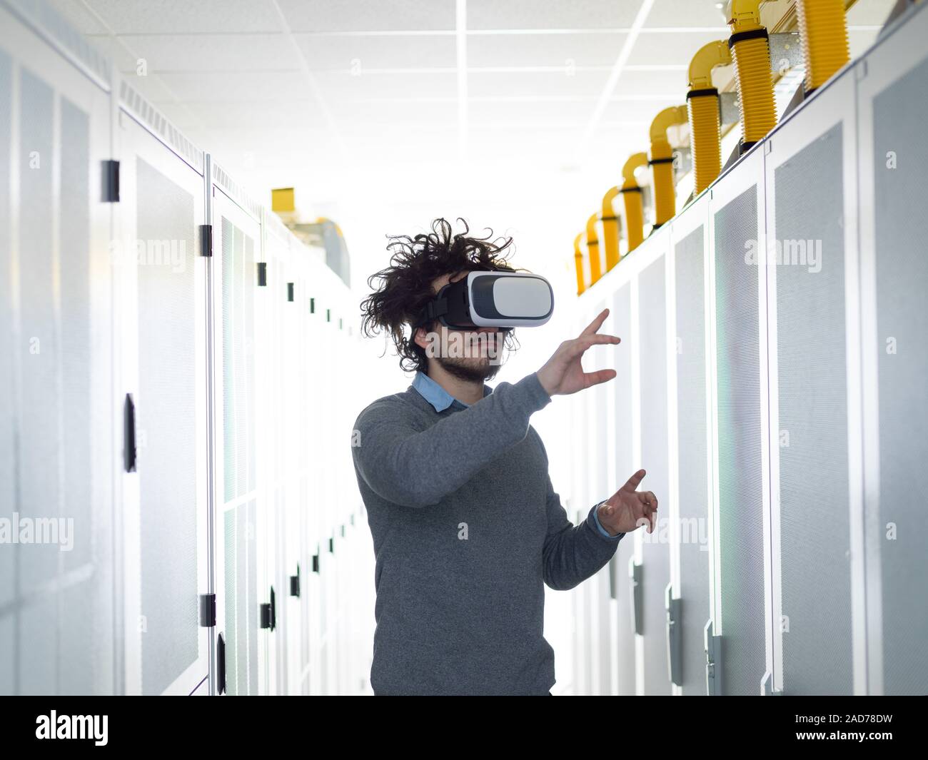 IT engeneer using virtual reality headset Stock Photo