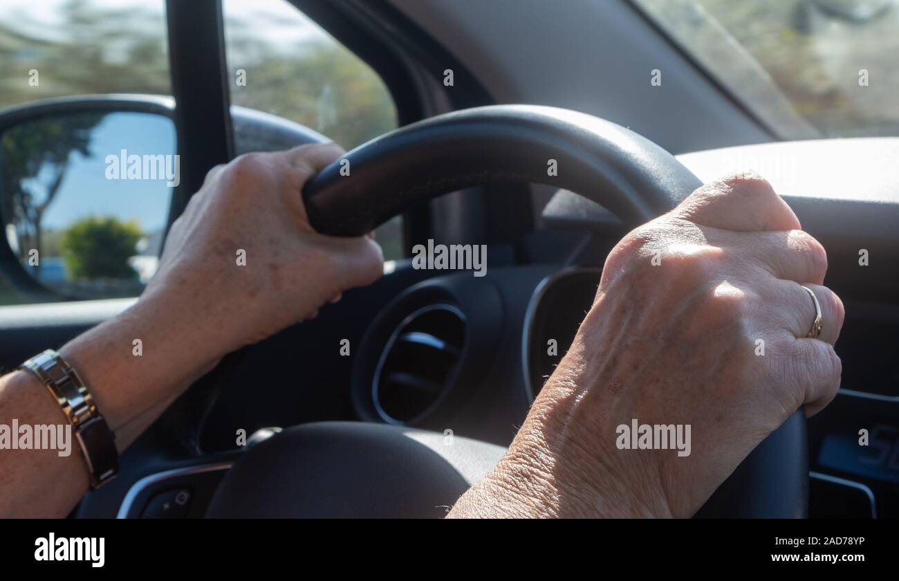 Hands on steering wheel hi-res stock photography and images - Alamy