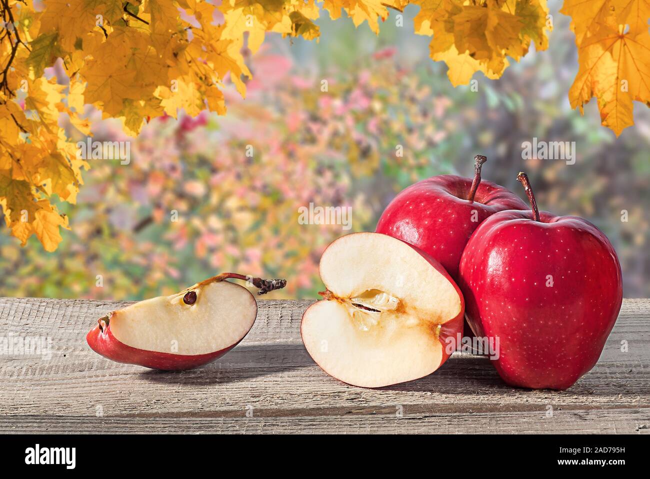 Several apples on a wooden table Stock Photo