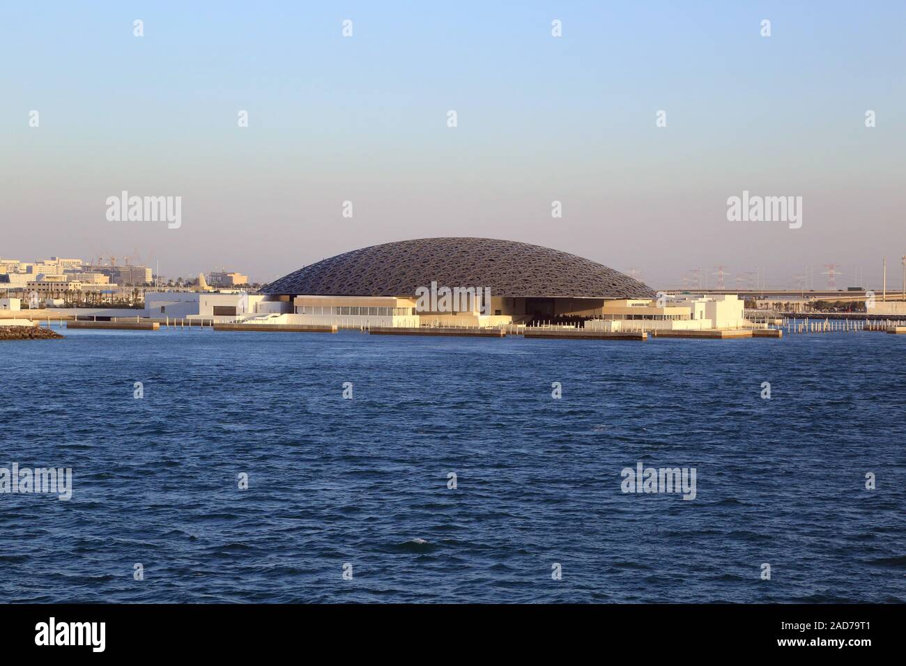 Louvre Abu Dhabi, modern art museum with domed roof at the Persian Gulf Stock Photo