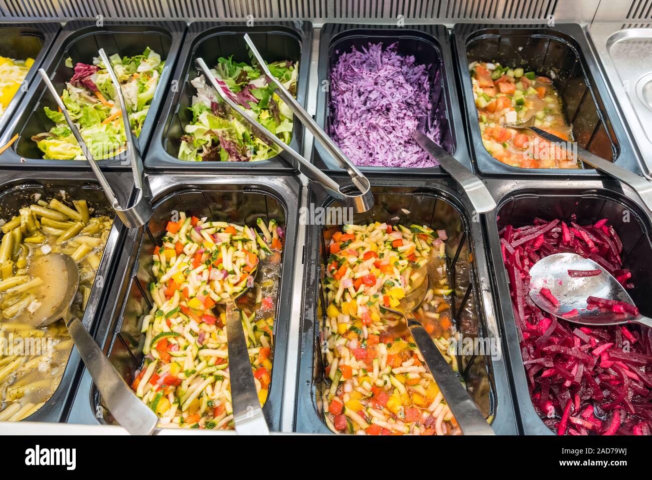 Colorful salads at a buffet in a restaurant Stock Photo