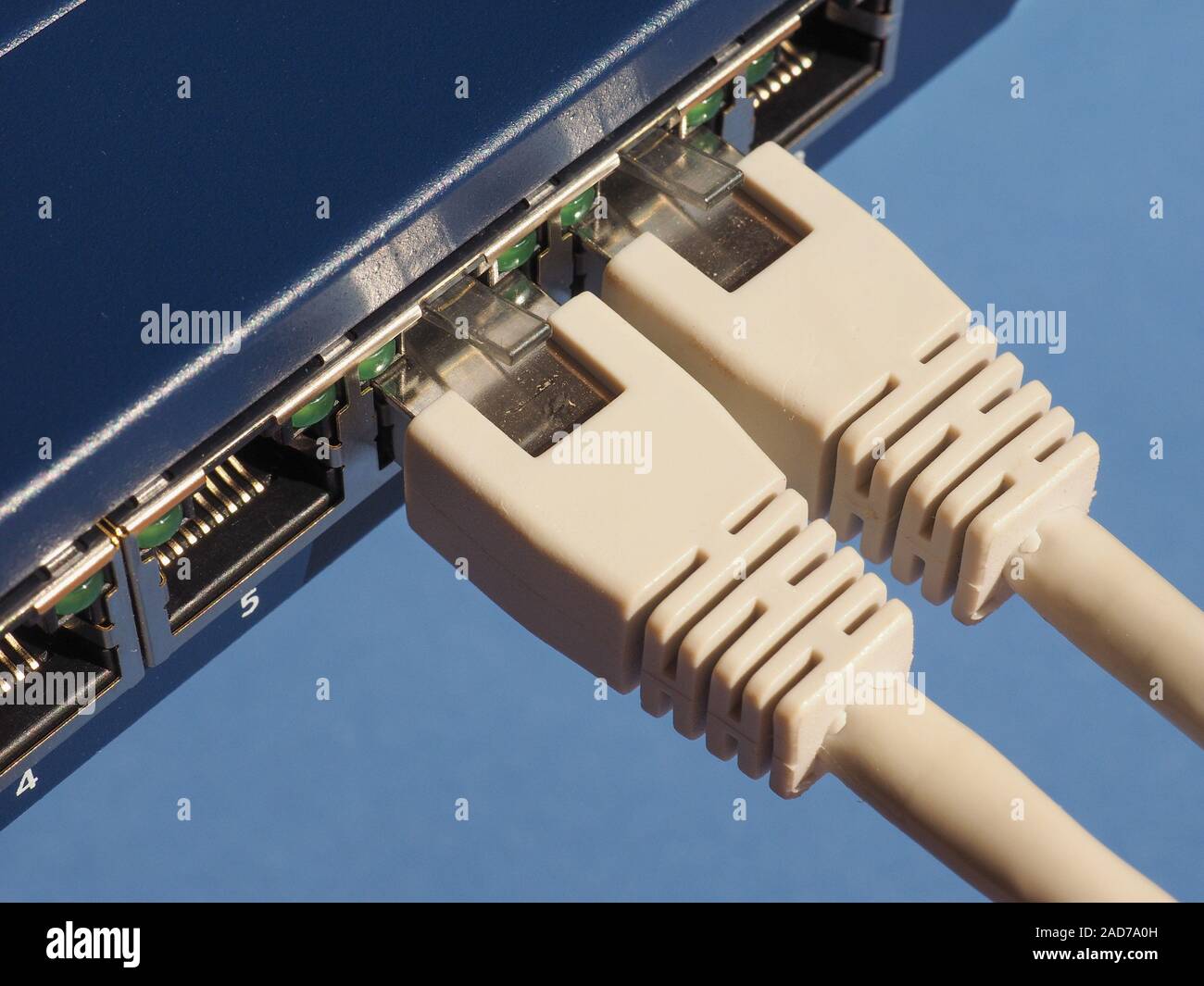 Modem router switch with RJ45 ethernet plug ports Stock Photo - Alamy