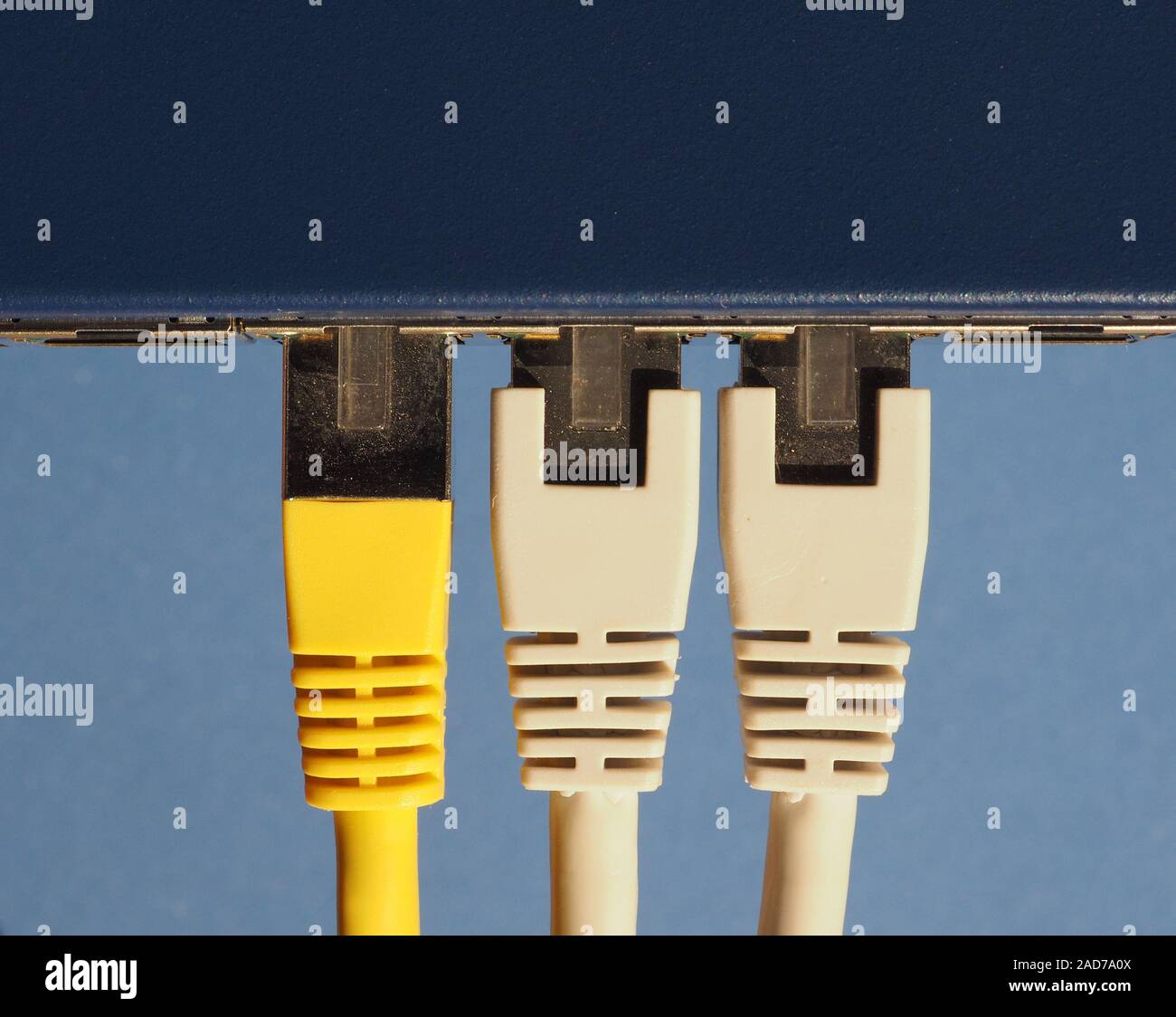 Modem router switch with RJ45 ethernet plug ports Stock Photo