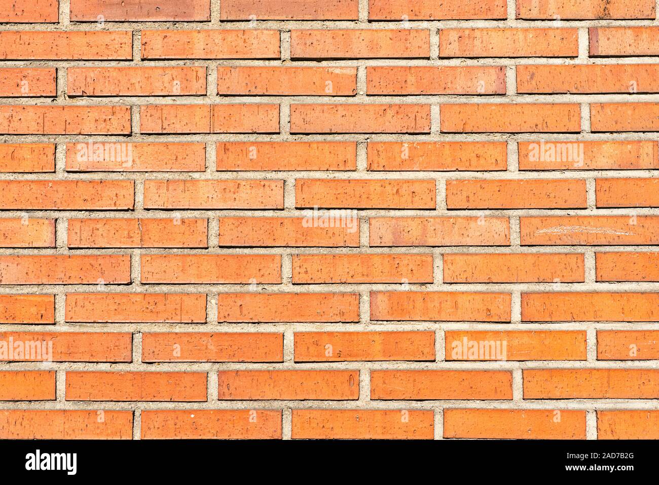 Background from an orange brickwall Stock Photo