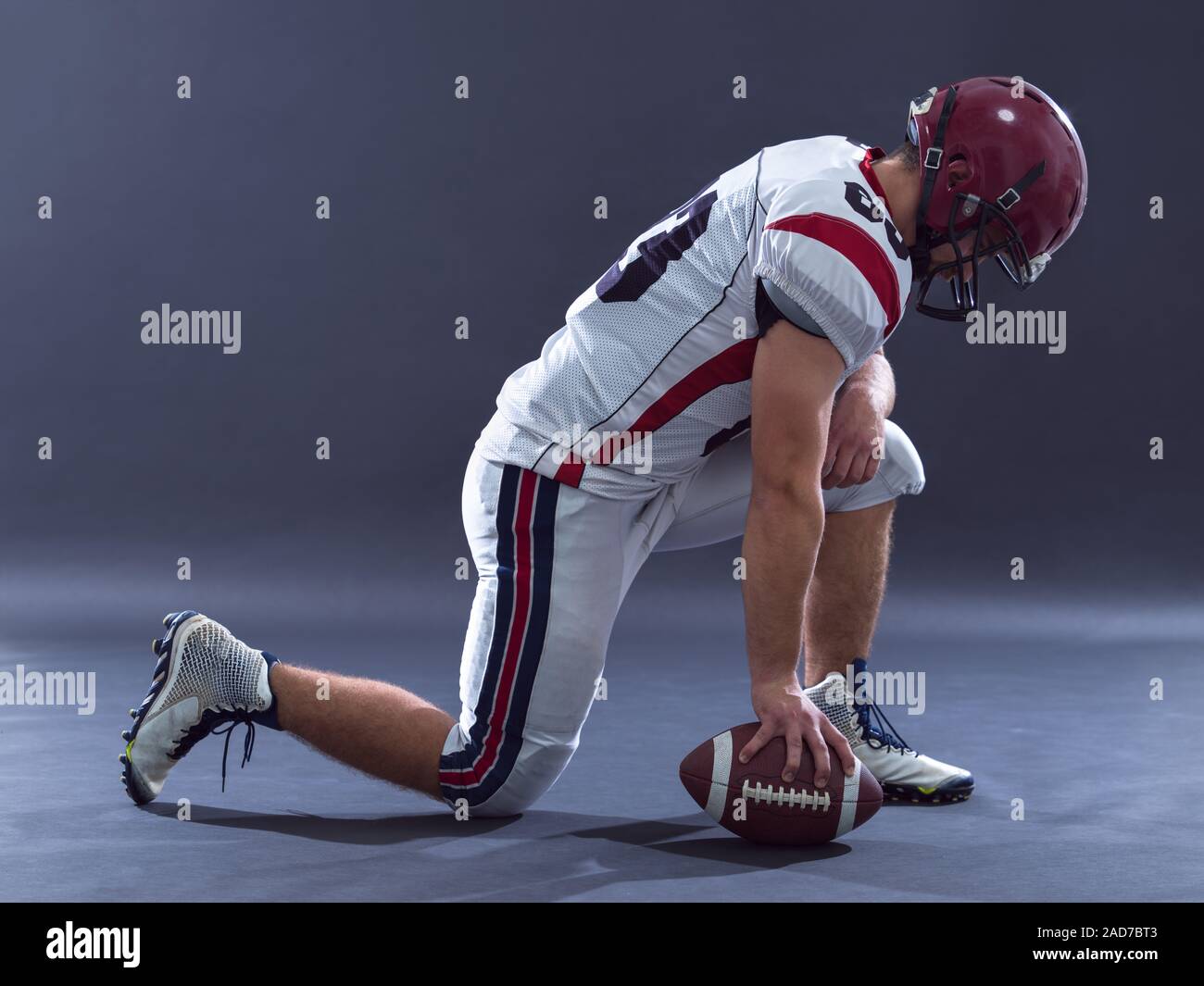 American football player getting ready before starting Stock Photo Alamy