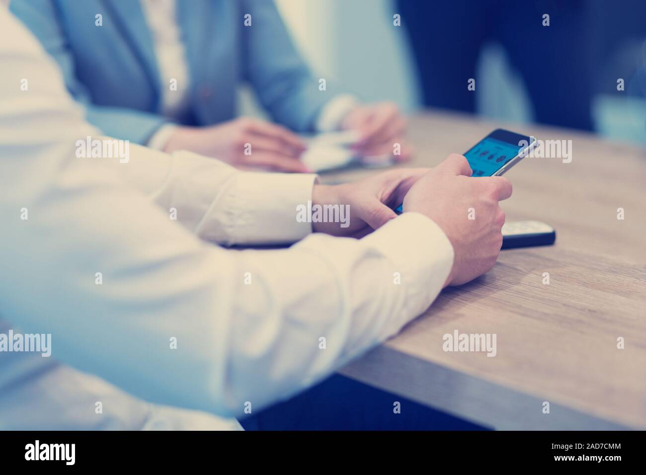 Young casual Businessman using smartphone Stock Photo
