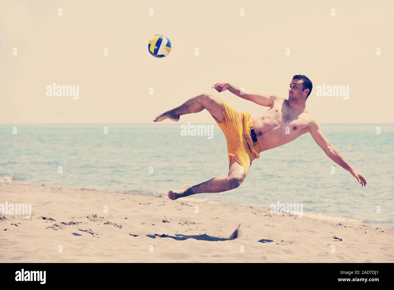 Young boy beach volleyball hires stock photography and images Alamy