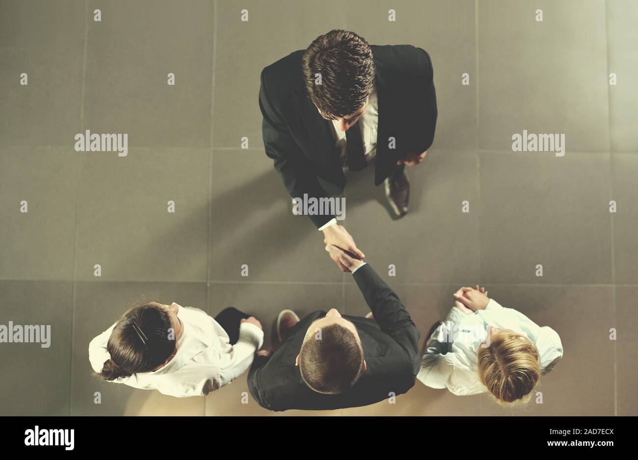 Business people making deal Stock Photo - Alamy